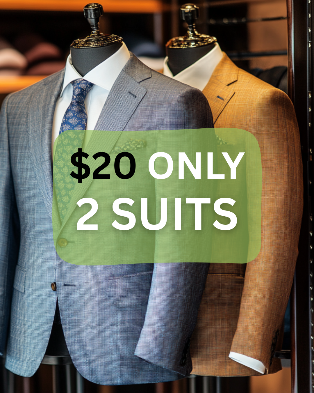 Two black suits with ties are displayed on mannequins. A green label reads 