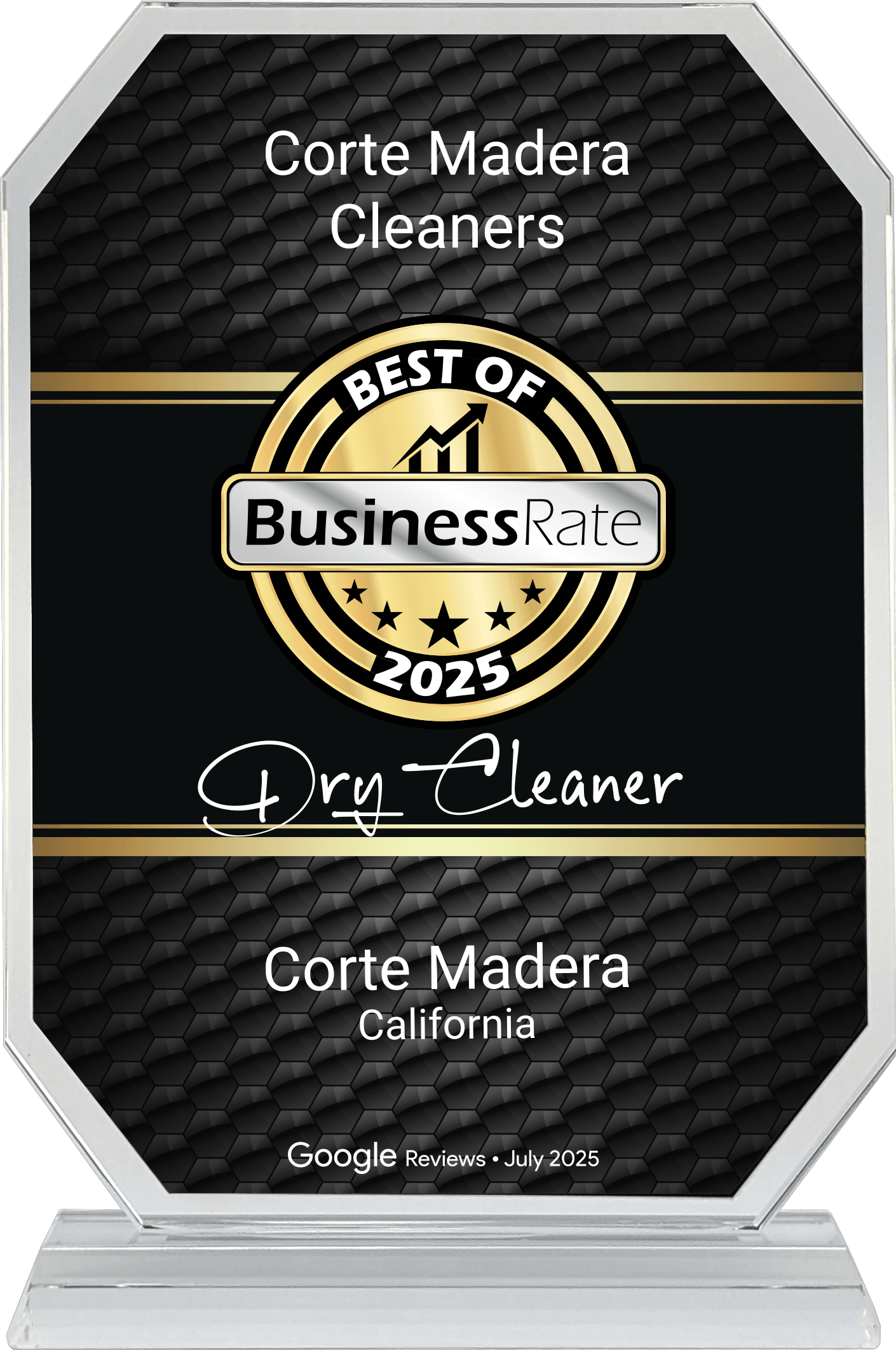 A glass award plaque reading "Best of Business Rate 2025 Dry Cleaner, Corte Madera Cleaners, Corte Madera, California, Google Reviews • July 2025.