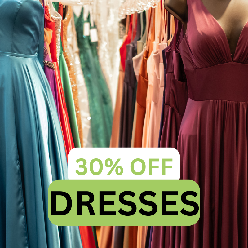 Row of formal dresses on display in a store, with a sign in the foreground that reads "30% OFF DRESSES.